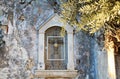 ÃÂ¡ross crucifix in the old stone wall. Royalty Free Stock Photo